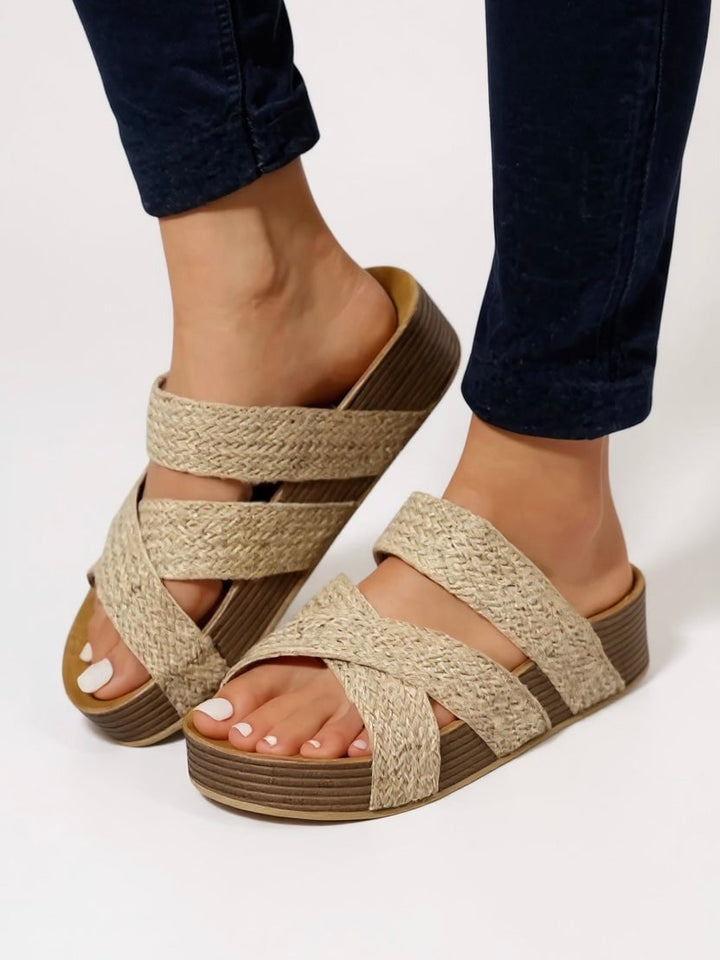Glade woven platform sandals in snake print colorway, angled three-quarter view