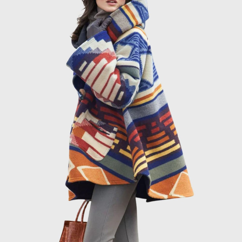 Full-length view of the Glena warm coat layered over a casual outfit, showcasing its versatile cozy style