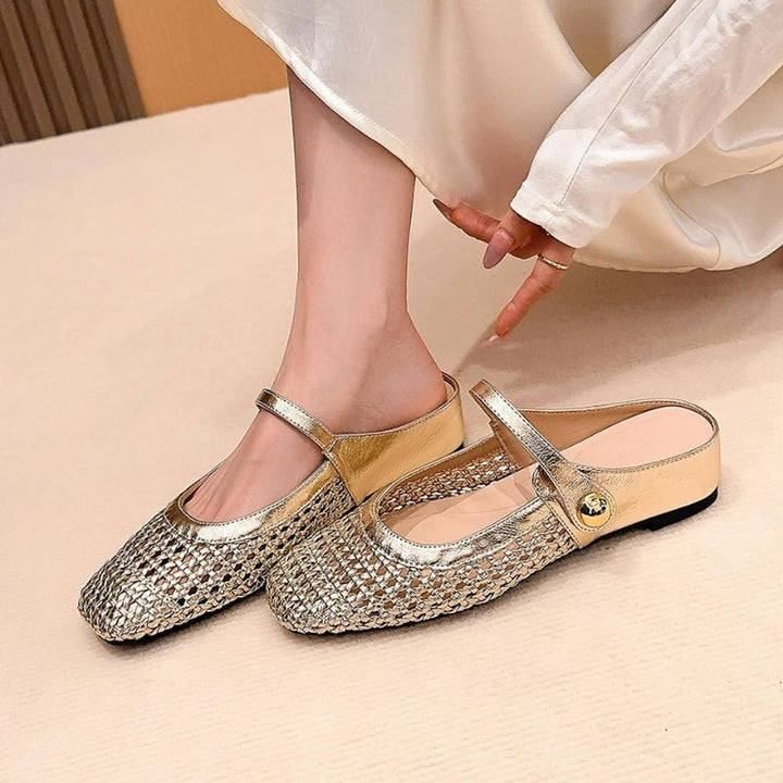 Goldie woven Mary Jane mule flat in black, front three-quarter view