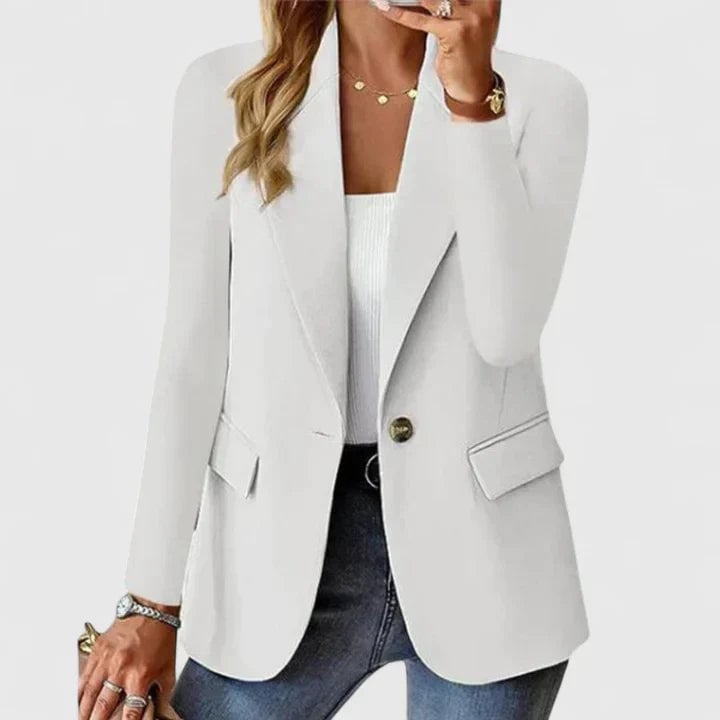 Grace elegant blazer styled over a simple top for a polished, put-together look