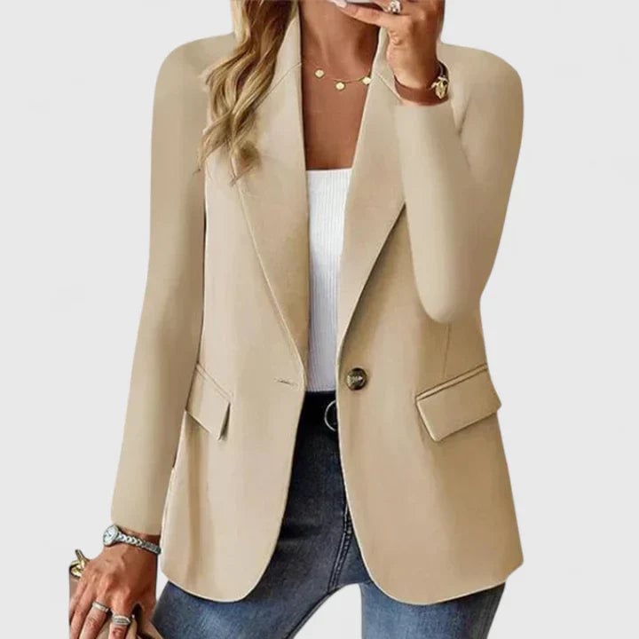 Close-up detail of the Grace elegant blazer lapel and button closure