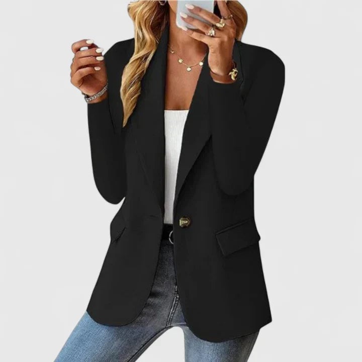 Grace elegant blazer in black layered over a slip dress for an evening look