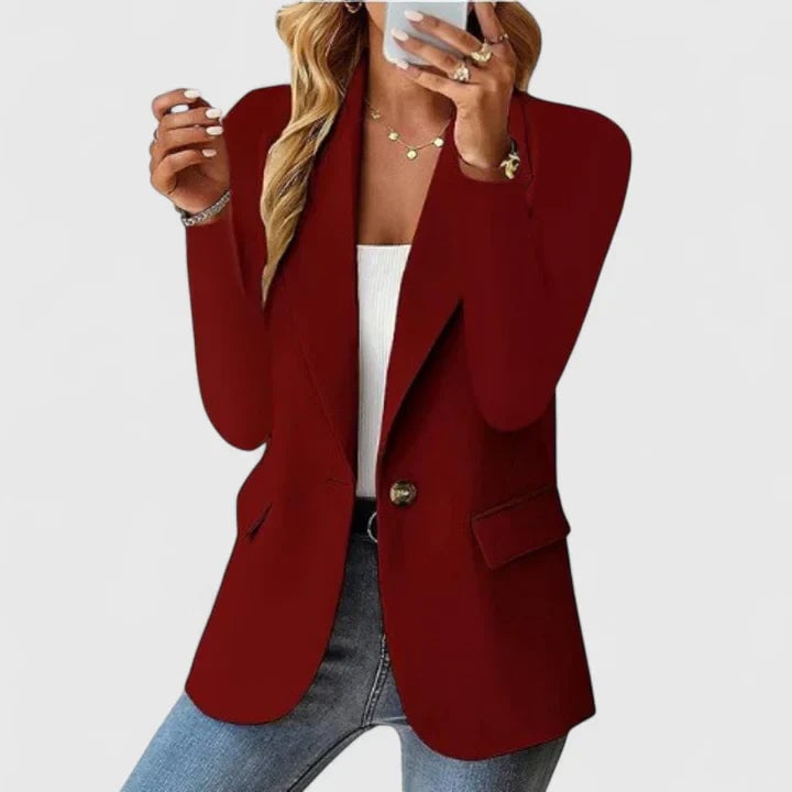 Flat lay of the Grace elegant blazer showing fabric texture and available color options