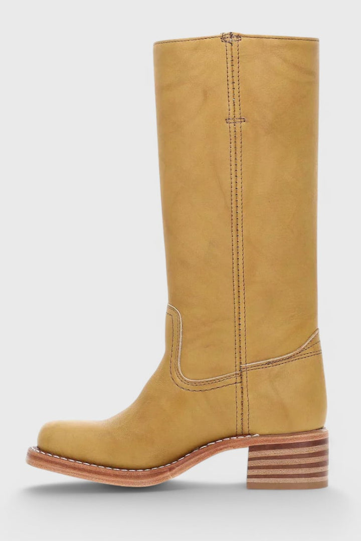 Grace boots in brown displayed on a model from the knee down
