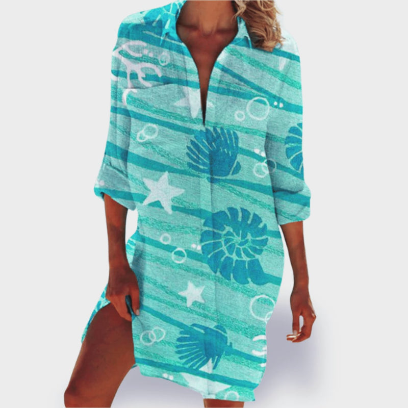 Close-up of the lightweight breathable fabric and colorful print of the Grace dress