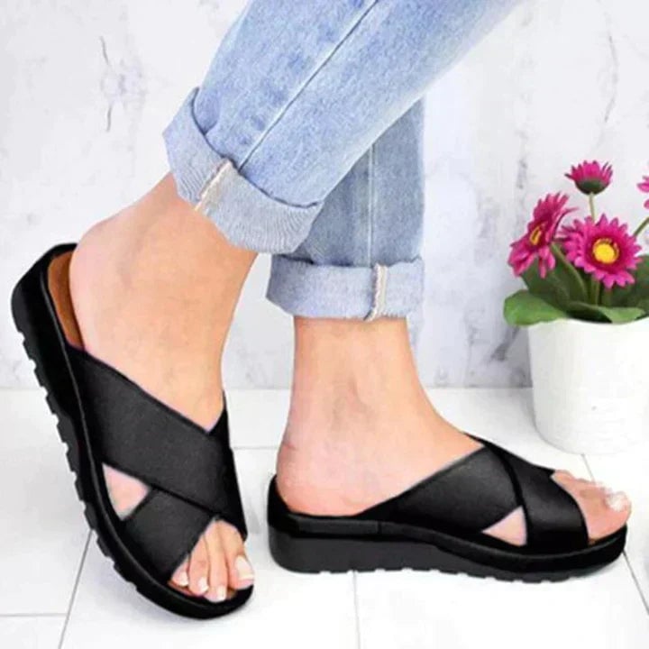 Grace sandals in black paired with a flowy midi skirt outfit