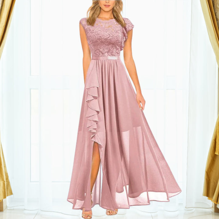 Side view of the Grace lace maxi dress showing the ruffle split detail and flowing A-line chiffon skirt