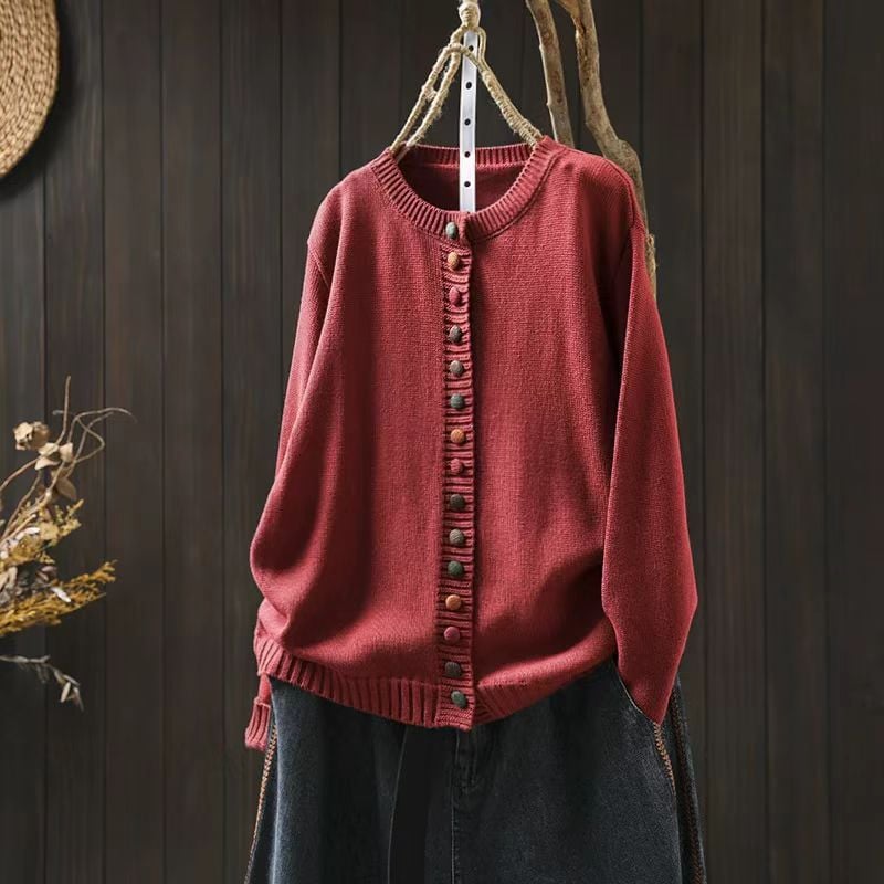 Flat lay of a light blue women's cardigan showing overall shape and length