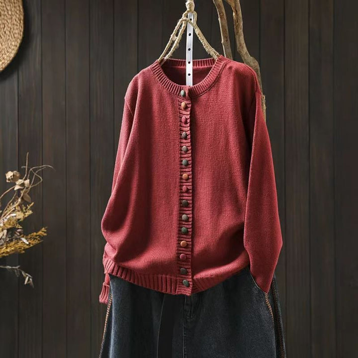Flat lay of a light blue women's cardigan showing overall shape and length