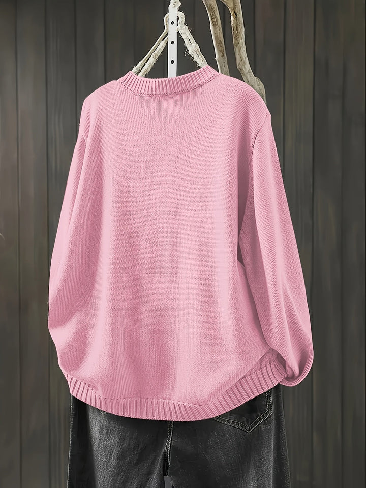 Army green women's cardigan displayed on a hanger showing full silhouette