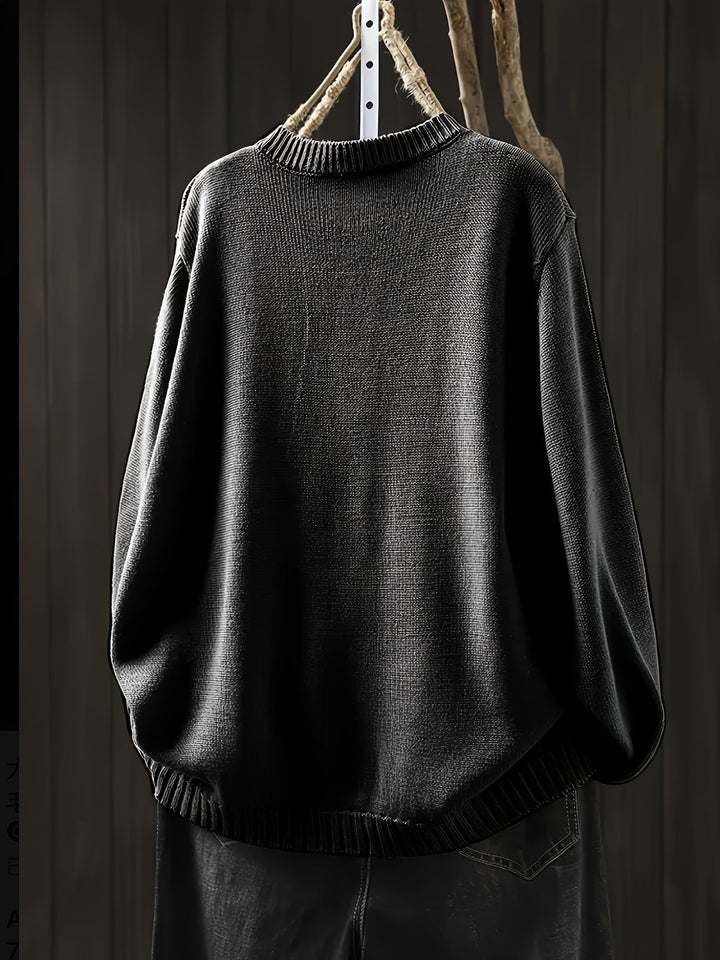 Detail shot of button placket on a women's everyday cardigan in beige