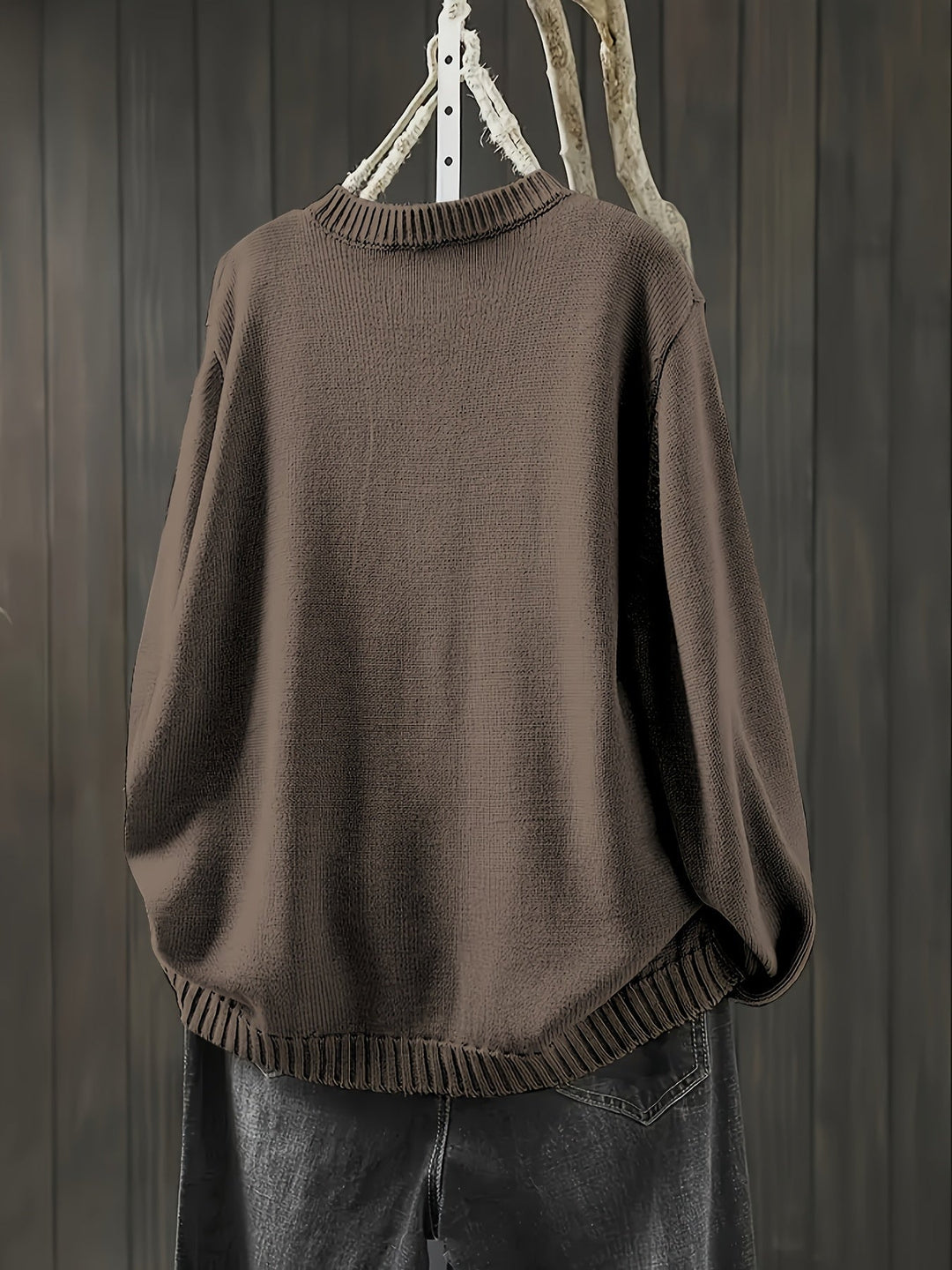 Group flat lay of women's cardigans in multiple colors including pink, black, and army green