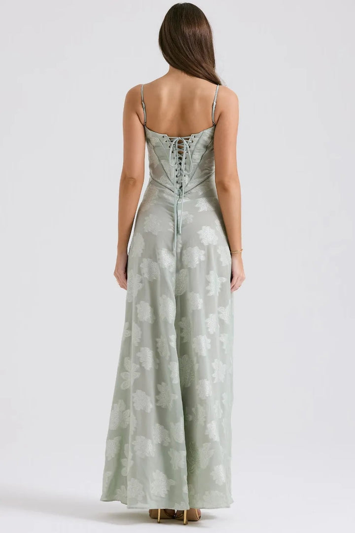Close-up of the lightweight draping fabric on a long pink summer maxi dress