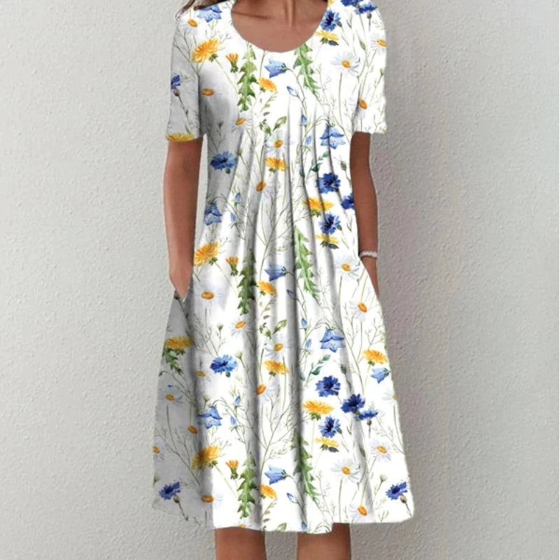 Close-up of the floral print detail on a relaxed-fit dress with practical side pockets