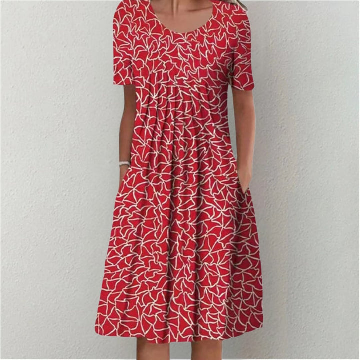 Woman in a polka dot dress styled with sandals for a casual summer outing
