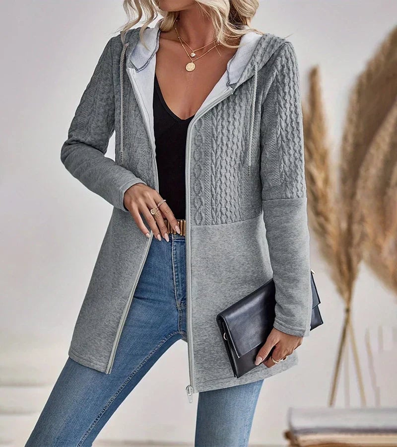 Model wearing the Hadley zip-up hoodie paired with leggings for a casual everyday look