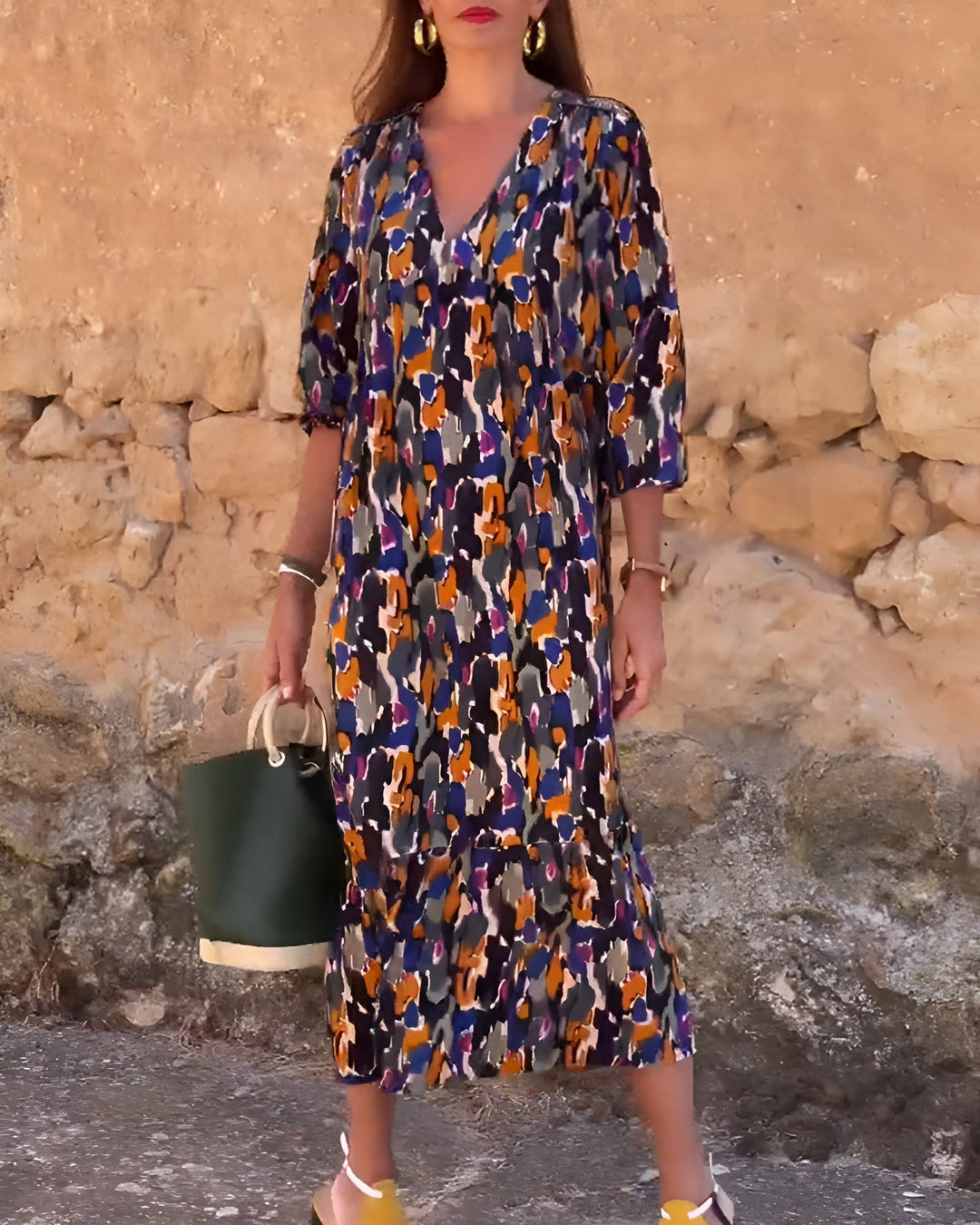 Side view of the Hadley flowy printed dress showing soft drape and tummy-control fit