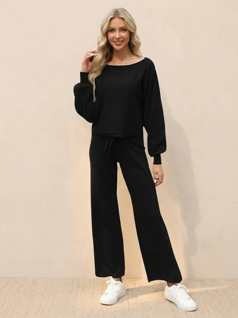Side view of the Hailey wide-leg pants and cropped sweatshirt set in apricot highlighting the relaxed silhouette