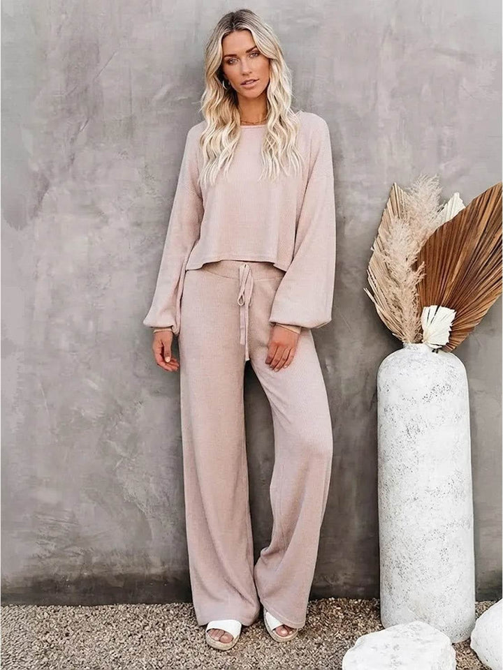 Side view of the Hailey matching sweatshirt and wide-leg pants set in khaki