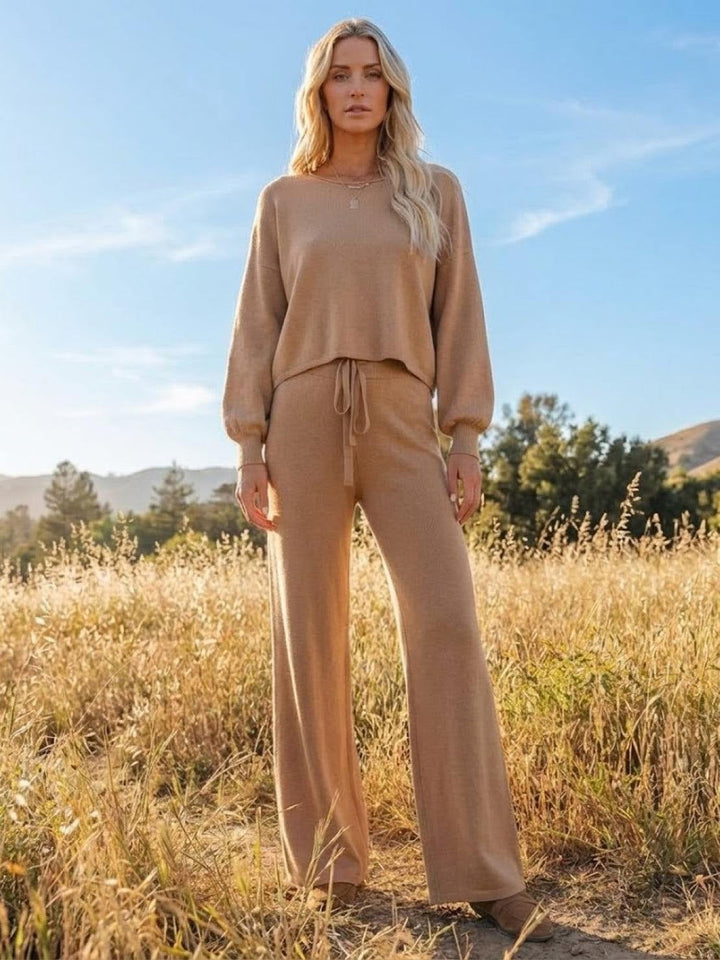 Woman wearing the Hailey lounge set in navy blue styled casually