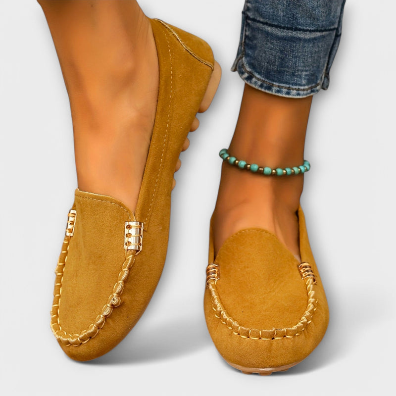 Haley moccasin slip-on in turquoise colorway on a white background