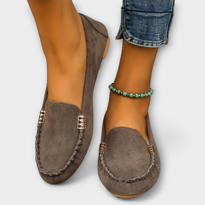 Haley moccasin slip-on in pink colorway displayed from a side profile angle