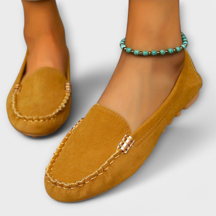 Pair of Haley moccasin slip-ons styled with casual denim outfit