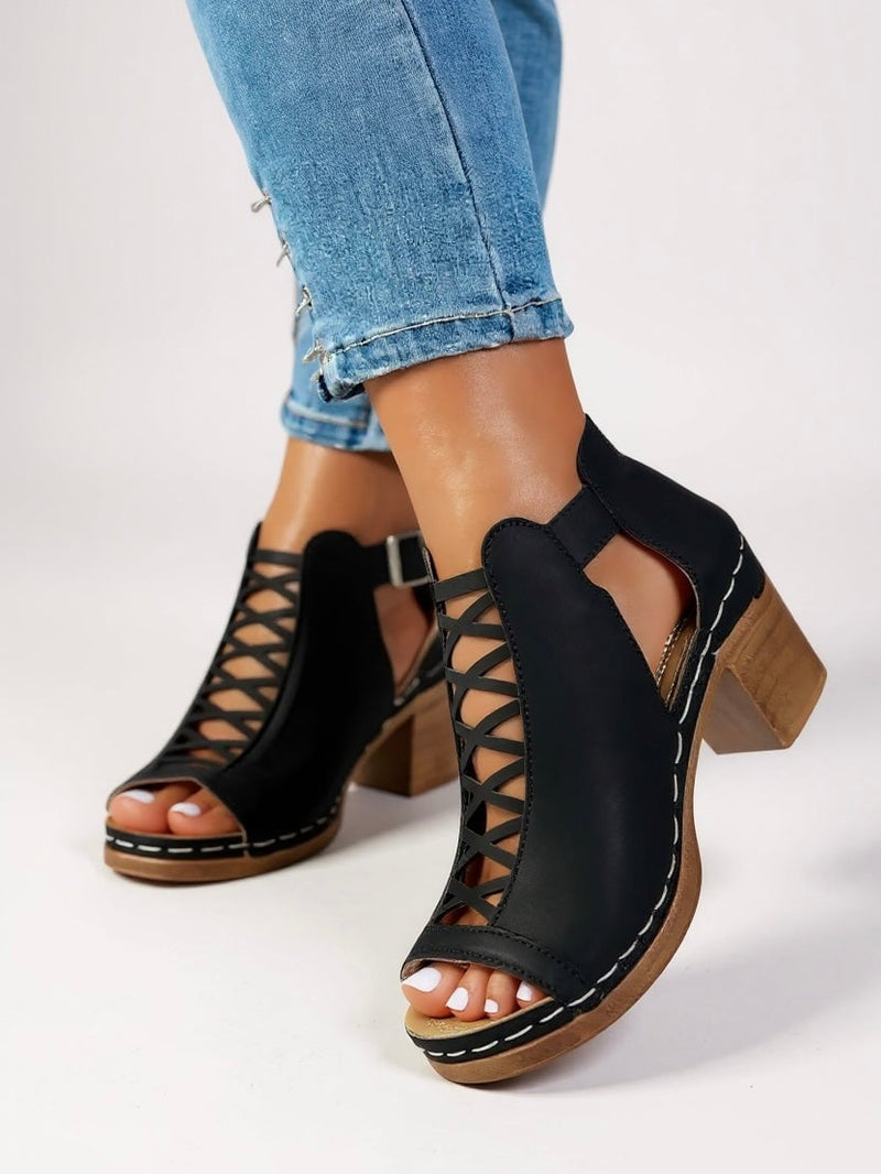 Halle cushioned sandals in black showing criss-cross strap detail from above