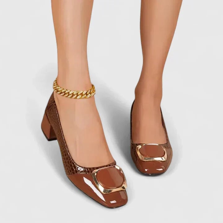 Hallie loafers in Black shown from the back quarter angle highlighting the cushioned collar