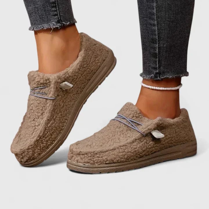 Hana orthopedic loafers in a neutral colorway shown from a three-quarter front angle on a clean background