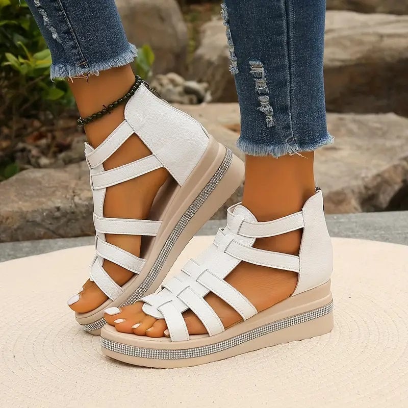 Pair of Hannah black rhinestone sandals displayed on a neutral background