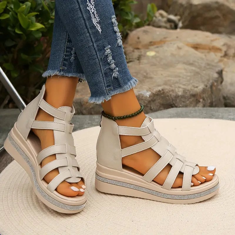 Woman wearing Hannah white comfort sandals while walking on a summer sidewalk