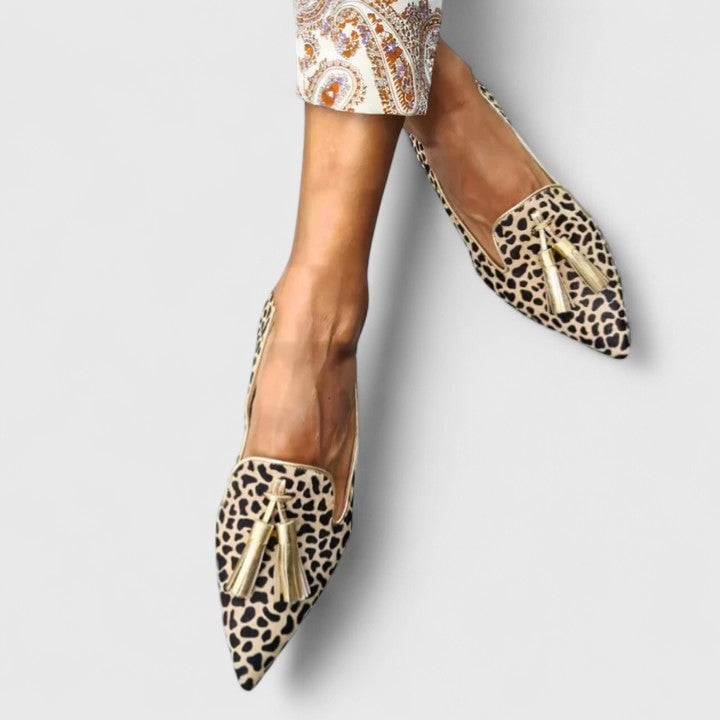 Hannah classic comfort loafers in gold displaying flexible sole and timeless classic design, side profile view