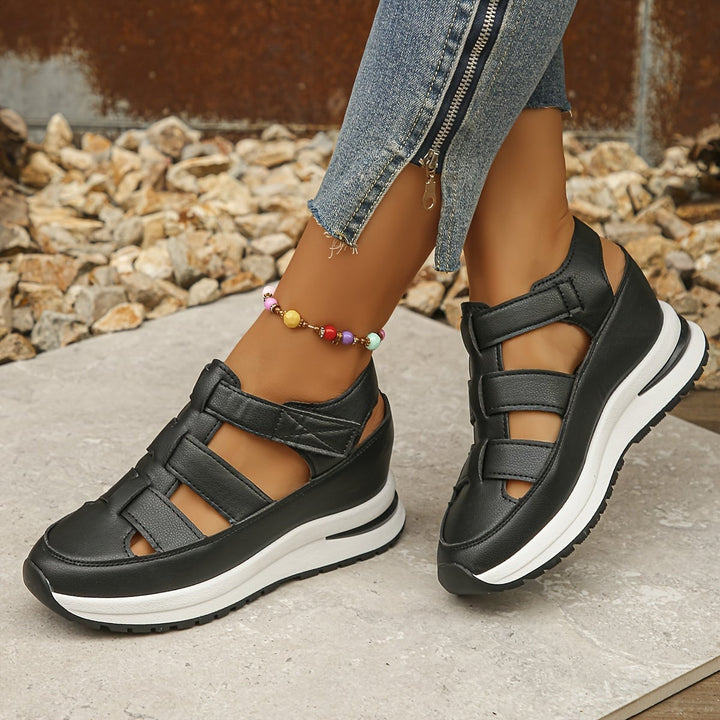 Harlow women's black platform sandals, top-down view showing strap detail
