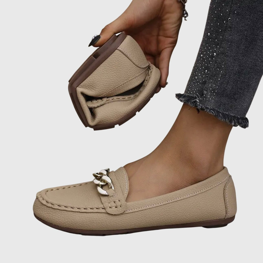 Harlow loafers in black with gold chain detail, side profile view