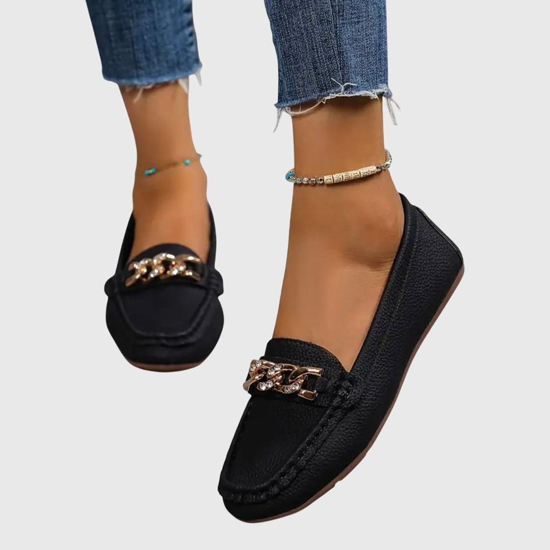 Harlow slip-on loafers shown from the sole angle highlighting flat profile and slip-on construction