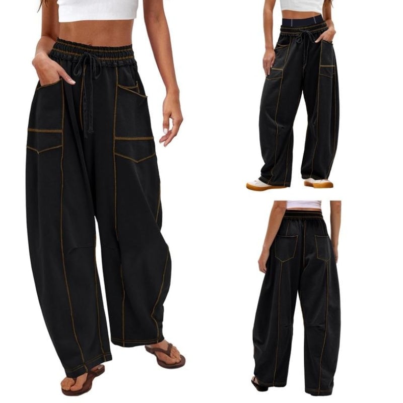 Front view of Harlow wide leg cargo pants in black with contrast topstitching and high waist drawstring
