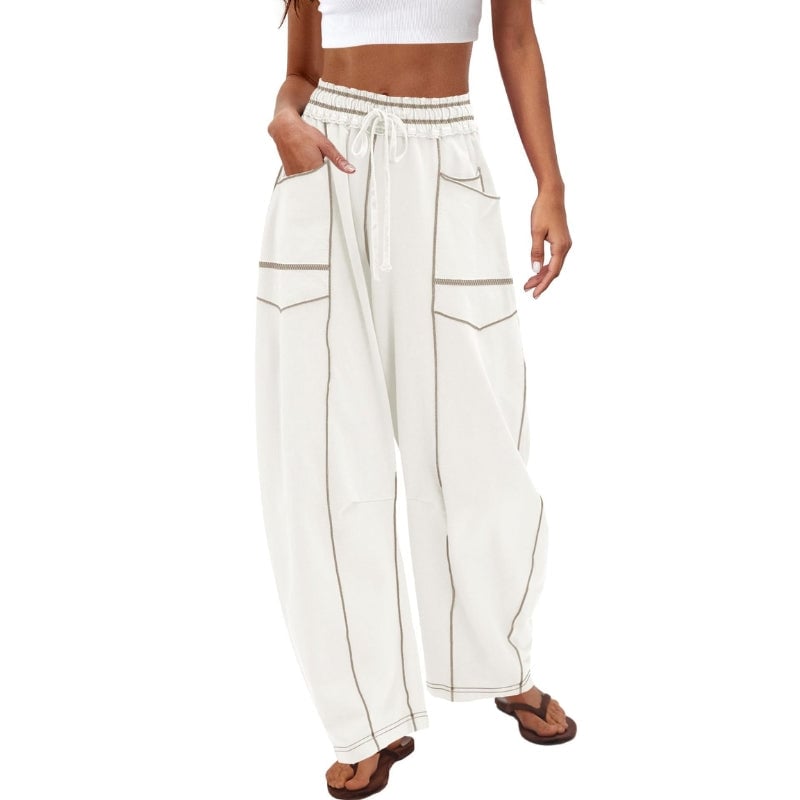 Close-up of elastic drawstring waistband detail on Harlow high waist cargo pants