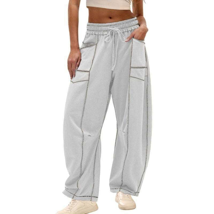 Harlow cargo pants styled with a fitted crop top and sneakers for a casual street look
