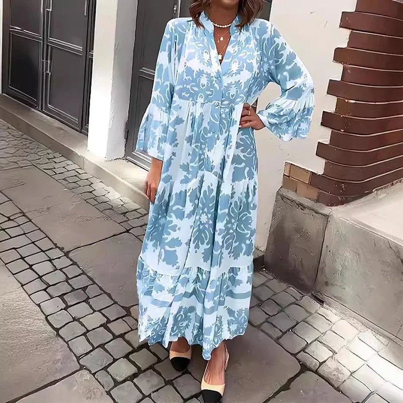 Front view of the Harmony printed maxi dress showing draped silhouette and vibrant boho print