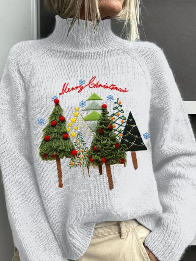 Woman wearing a white classic elegant Christmas sweater with a flattering relaxed fit, styled for the holiday season