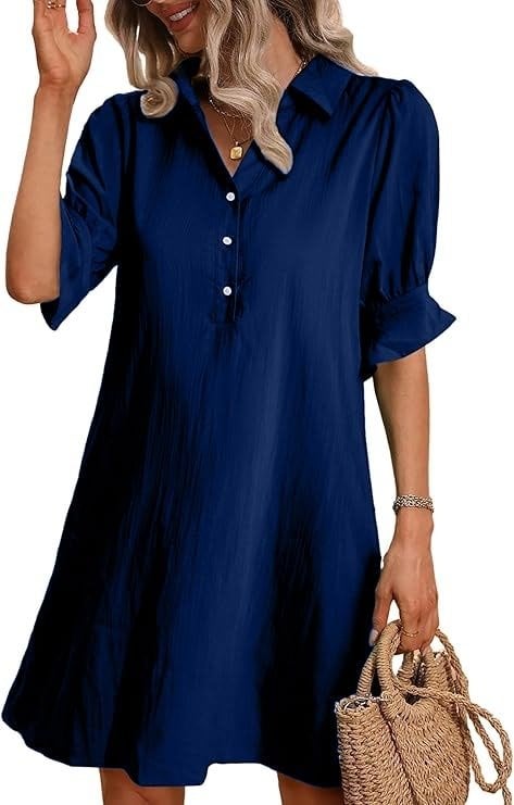 Close-up of ruffle flared cuffs on the Harper 3/4 sleeve shirt dress in black