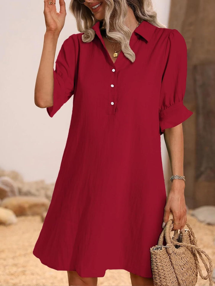 Harper shirt dress in blue with side seam pockets, three-quarter view