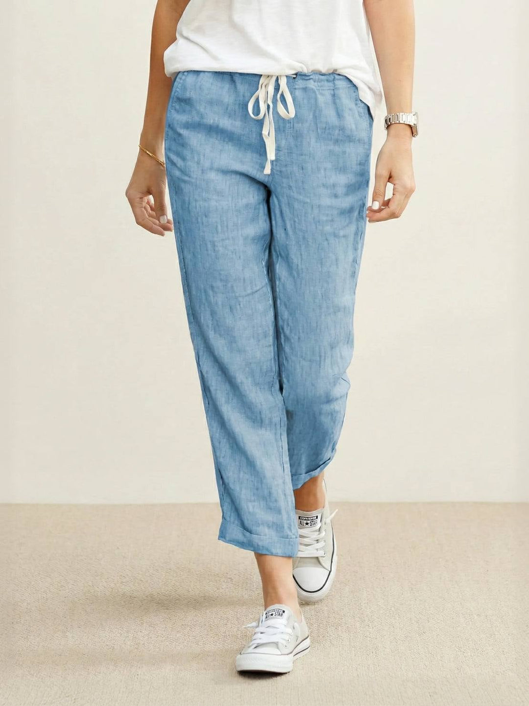 Full-length front view of Harper straight-leg pants in black