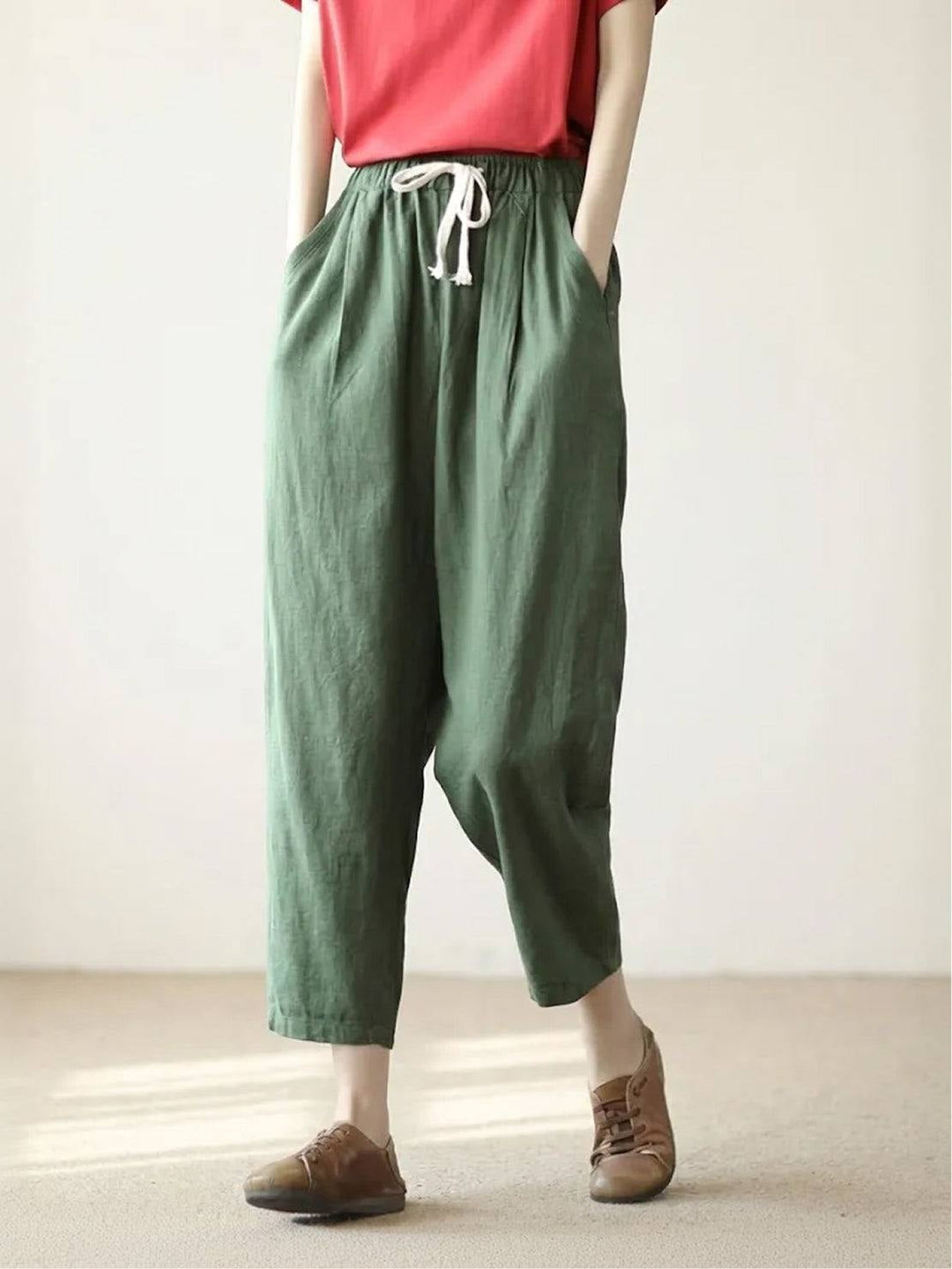 Back view of Harper casual pants in black showing straight-leg silhouette