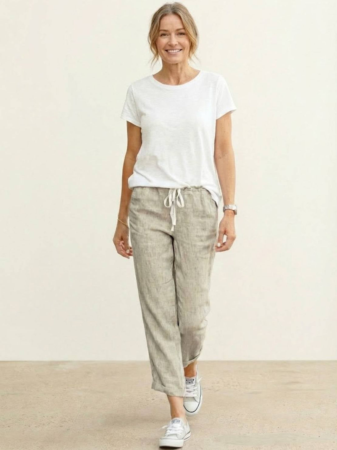 Close-up of drawstring waistband on Harper pants in black