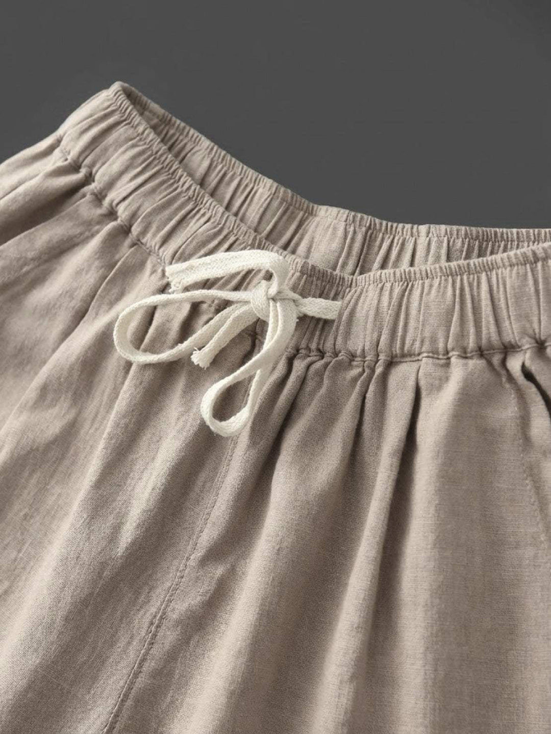 Full-length front view of Harper straight-leg pants in rusty orange