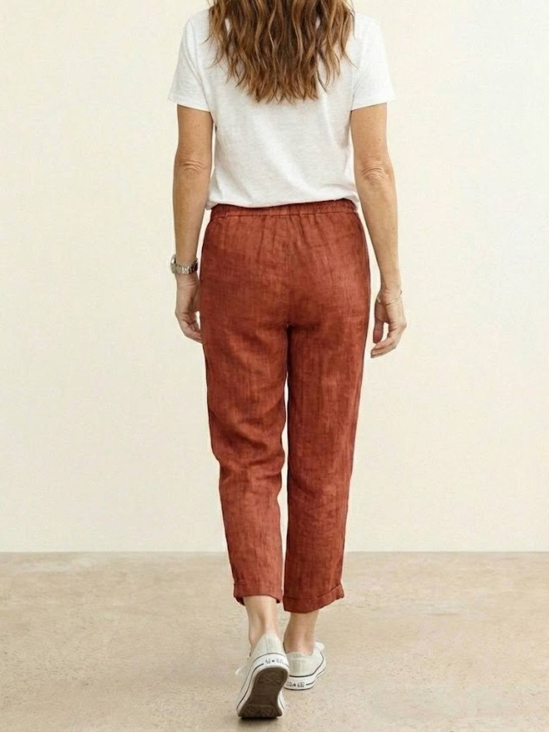 Back view of Harper casual pants in navy blue showing relaxed straight-leg cut