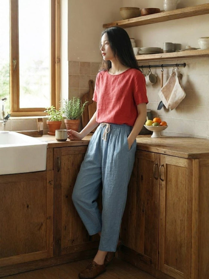 Side view of Harper straight-leg pants in army green highlighting relaxed fit