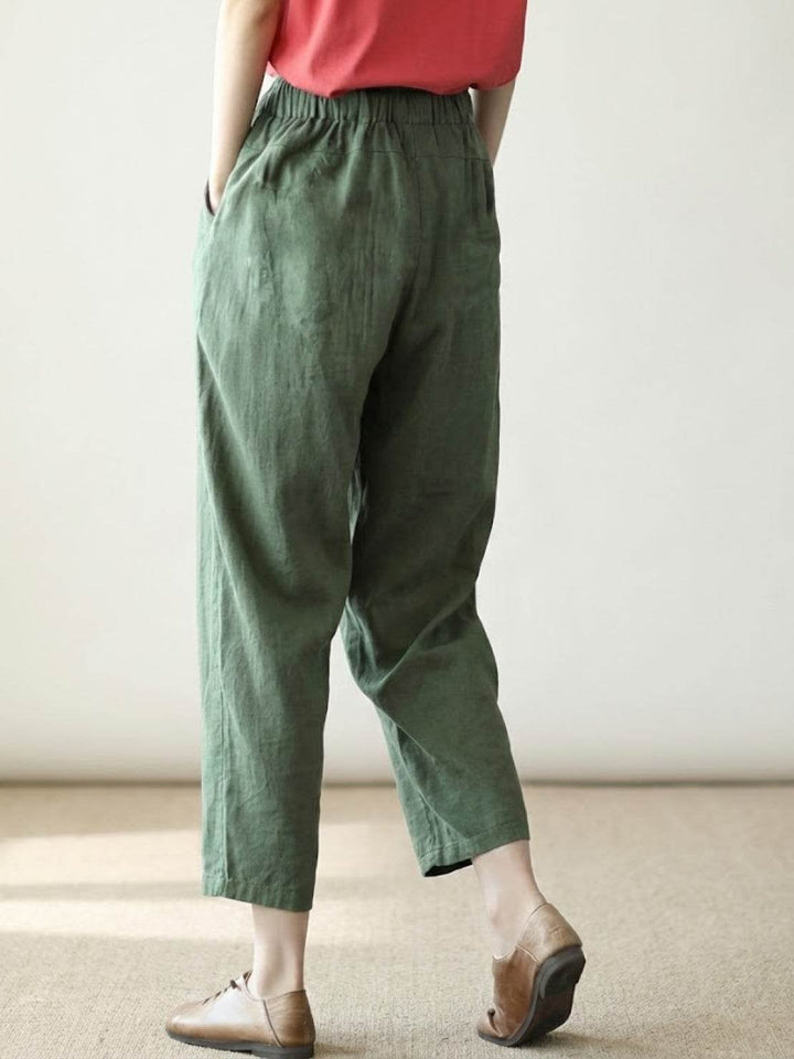 Flat lay of Harper straight-leg pants in multiple color options